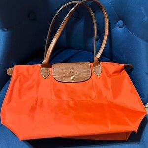 Longchamp Vibrant Orange Tote with Brown Accents